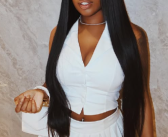 Songstress Cocotrey Stuns in Elegant White Ensemble with a Powerful Caption