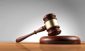 Trader remanded over robbery after proposing to them