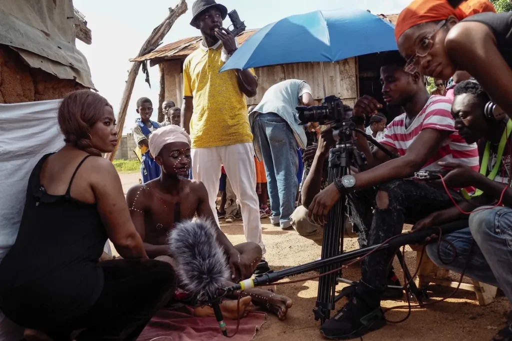 actors and the technical team film a scene during the making of a kumawood film factory of kumasi ghana movie on may 22 2017